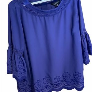 Beautiful rich purple top with embroidered detailing.